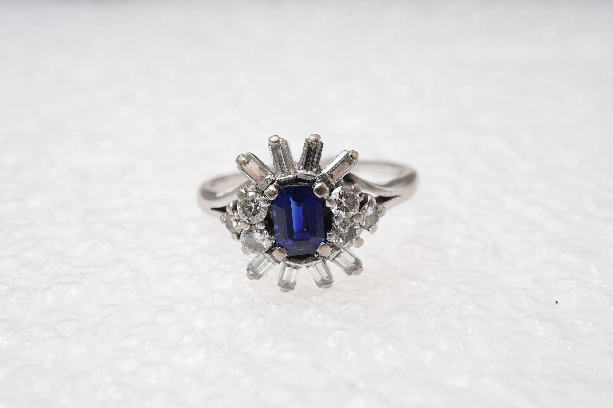 A sapphire and diamond ring, mid 20th century
